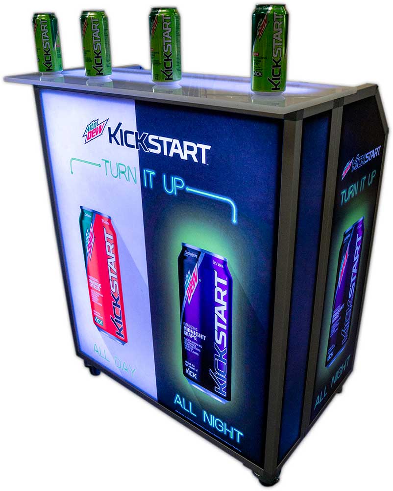 Compact Mobile Mini portable bar featuring vibrant LED-illuminated Mountain Dew Kickstart graphics in blue and green, showcasing the "Turn It Up" campaign Mobile Mini portable bar with LED-backlit Mountain Dew Kickstart branding